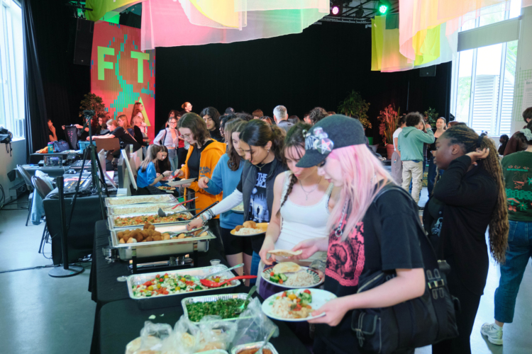 People eating at a bufet