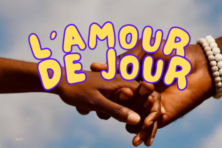 Deux mains se tiennent et il est inscrit au-dessus L'amour de jour.